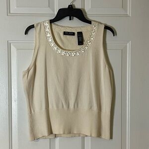 Axcess sleeveless round‎ neck cream sweater.